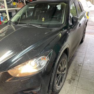 Замена аккумулятора на Mazda CX-5 I 2011 - 2015 2.0 (150 л.с.) Замена аккумулятора на Mazda CX-5 I 2011 - 2015 2.0 (150 л.с.)
