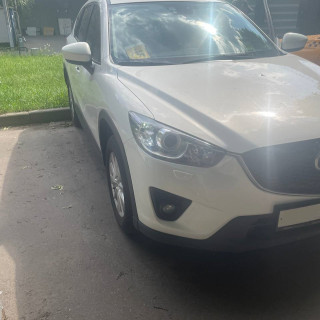 Замена аккумулятора на Mazda CX-5 I 2011 - 2015 2.0 (155 л.с.) Замена аккумулятора на Mazda CX-5 I 2011 - 2015 2.0 (155 л.с.)